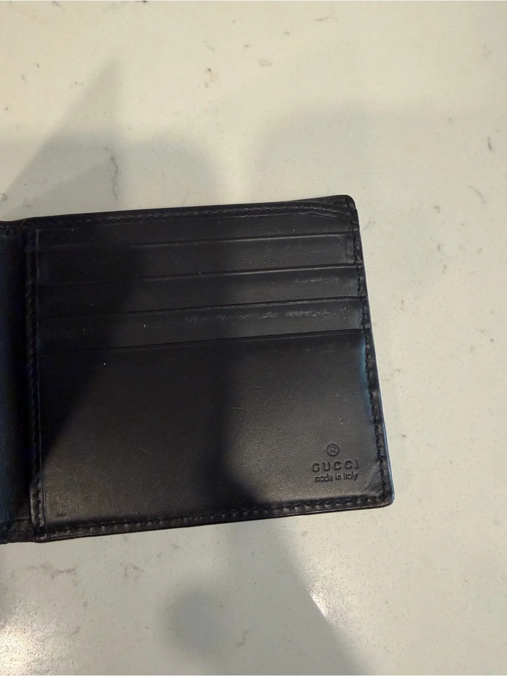 Gucci Black Embossed GG Leather Wallet with Silver-Tone Logo